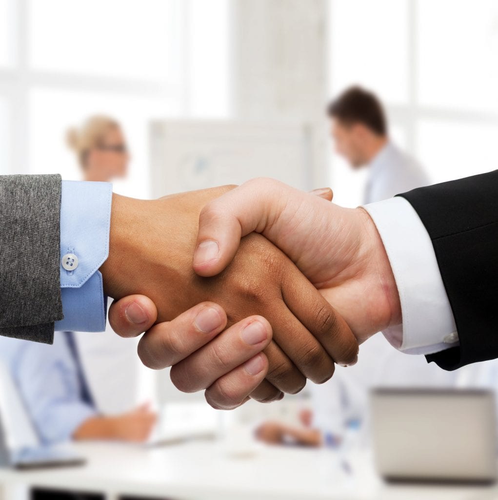 ISO 44001 Collaborative business partners shaking hands